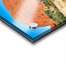 Vast red rock formation under a clear blue sky. Acrylic print