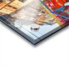 Sacred cow in Varanasi with people and shops in background Acrylic print