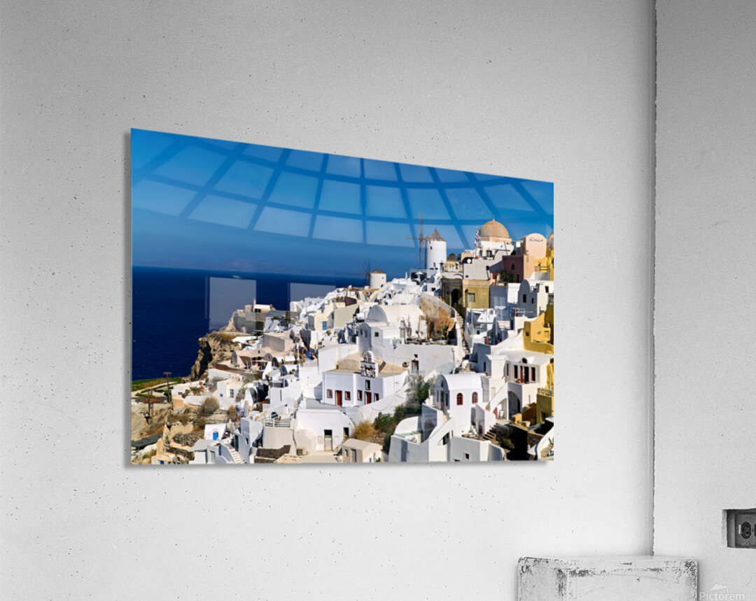 Oia Santorini: white cliffside village windmills and deep blu Acrylic Print