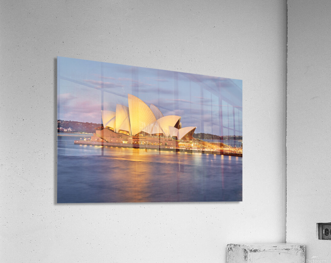 Sydney Opera House illuminated at dusk with harbor reflections. Acrylic Print