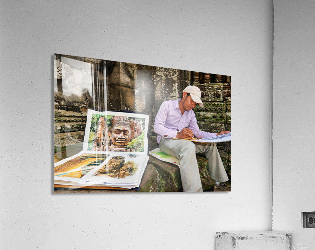 Artist drawing ancient temple carvings outdoors. Acrylic Print