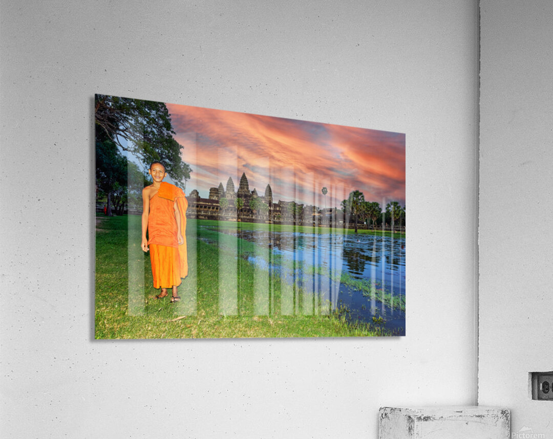 Monk stands by pond with Angkor Wat and sunset sky. Acrylic Print