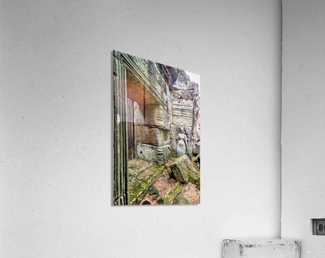 Ancient temple ruins with carved stone deity and moss. Acrylic Print