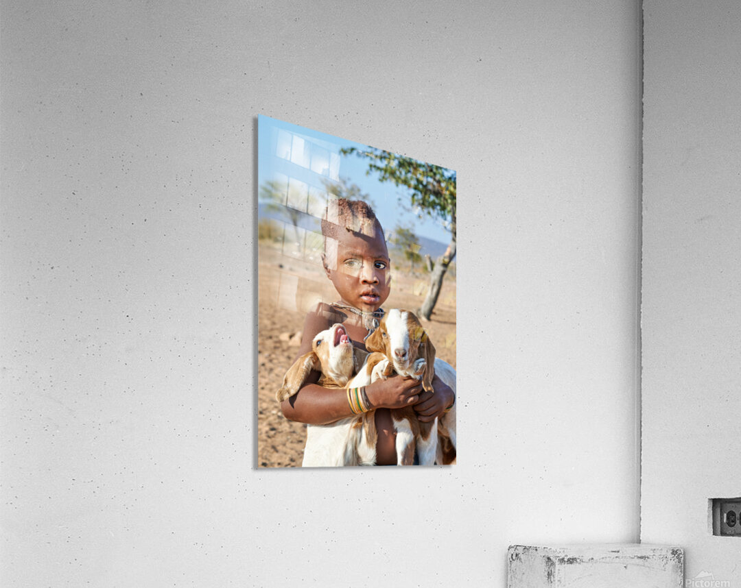 Child carries goats in Himba village of Namibia Kunene Region Acrylic Print