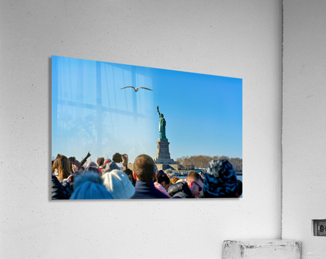 Tourists travel to Liberty Island by ferry in Manhattan New Yor Acrylic Print