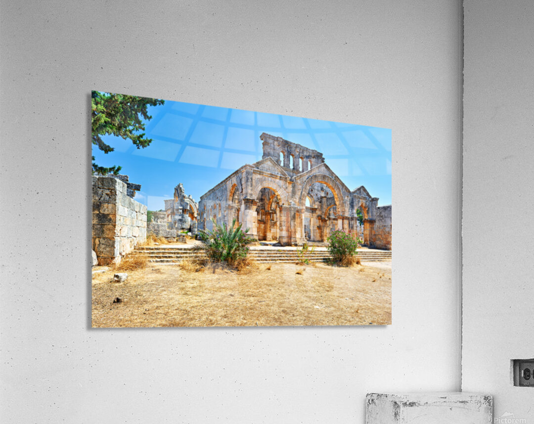Visitors explore the ruins of Church of Saint Simeon Stylites in Acrylic Print
