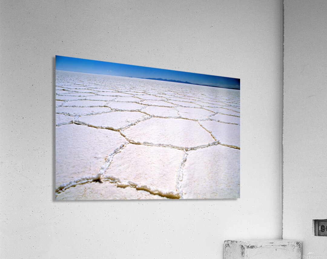 Expansive white salt flat with geometric patterns. Acrylic Print