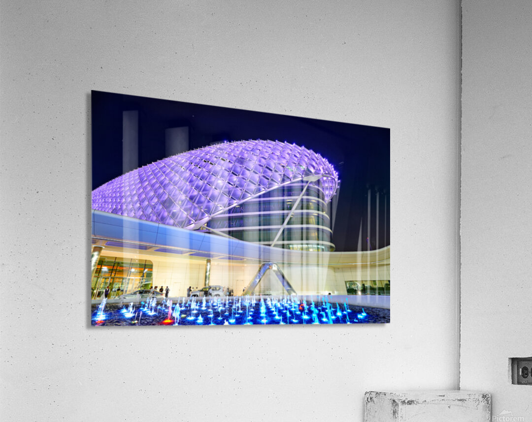 Visitors explore the W Abu Dhabi Yas Island hotel at night Acrylic Print