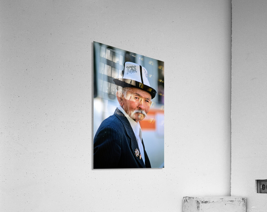 Elderly man in traditional hat walks in Bukhara Uzbekistan Acrylic Print