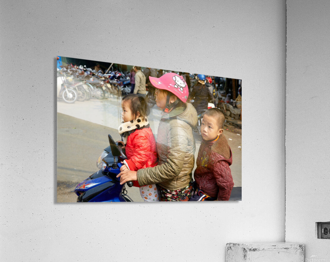 Children riding a motorbike in Hanoi streets Acrylic Print