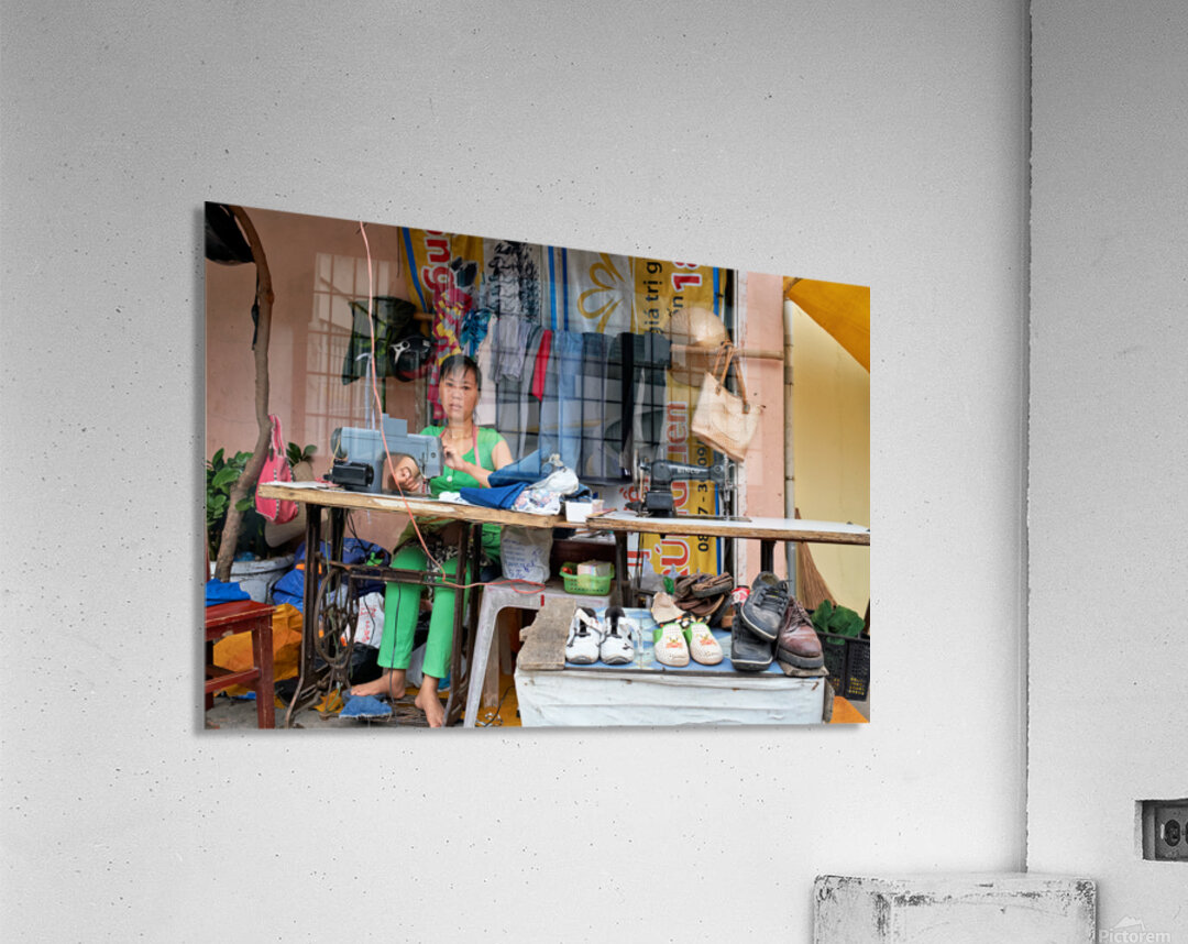 Sewing clothes at a market stall in Phu Quoc Vietnam Acrylic Print