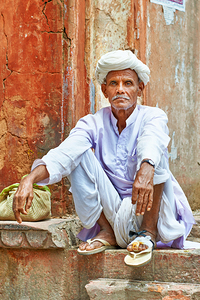 Portrait of a man with white turban sitting in Jaipur India