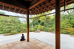 Meditation at Nishiki Tenmangu temple shrine in Kyoto Japan