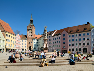 Visitors enjoy Hauptplatz square in Landsberg am Lech Bavaria