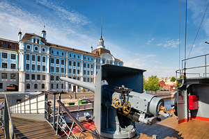 Cruiser Aurora in St. Petersburg with city background