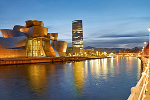 Guggenheim Museum view at night in Bilbao Spain by the river