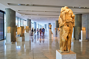 Visitors explore the Acropolis Museum in Athens Greece during th by Marco Brivio