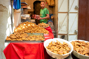 Fried sweets stall in the old town of Fez Morocco selling treat