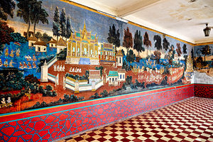 Vibrant Cambodian temple mural showcasing traditional life and a