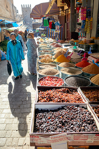 Sale of dried fruit and spices in the souk of Fez Morocco