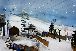 Indoor ski resort with chairlift and snow activities in Dubai