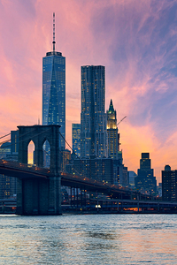 Brooklyn Bridge and Manhattan skyline during sunset in New York