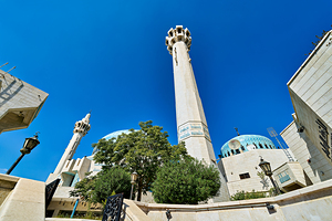 King Abdullah Mosque in Amman Jordan under clear blue sky