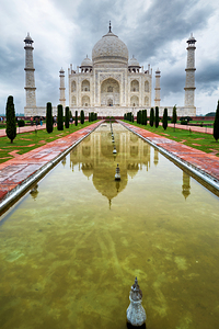 Explore the Taj Mahal Palace in Agra India during cloudy weather