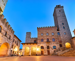 Sunset at Piazza del Duomo in San Gimignano Tuscany Italy