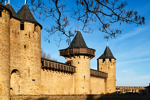 Historic fortress towers in Carcassonne France under clear sky