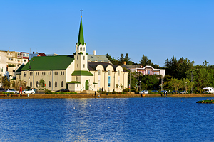 Lutheran Free Church near Lake Tjornin in Reykjavik Iceland