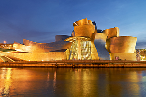 Guggenheim Museum shines at night in Bilbao Spain