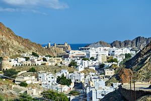 Cityscape of Muscat Oman with mountains and ocean view