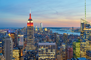 Manhattan aerial view showing Empire State Building at sunset