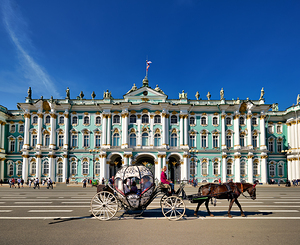 Horse carriage passes the Winter Palace in Saint Petersburg