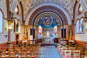 Visitors explore Chapelle Saint Leon IX in Eguisheim Alsace Fran