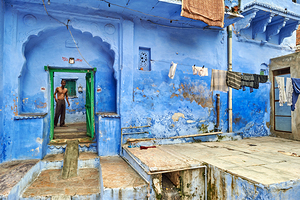 Man standing in decorated house in Bundi Rajasthan