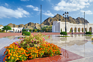 Visitors explore Al Alam Palace in Muscat Oman during the day