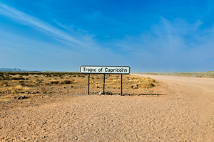 Driving on a dirt road at the Tropic of Capricorn in Namibia