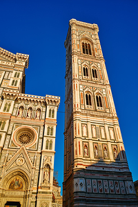 Campanile di Giotto stands tall beside Florence Cathedral in Tus