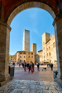 Visitors gather in San Gimignanos Piazza del Duomo in Tuscany