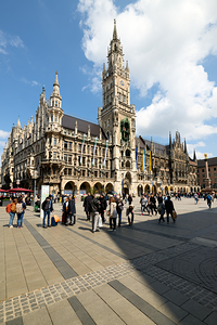 Visitors exploring Marienplatz near Munich Town Hall in Bavaria