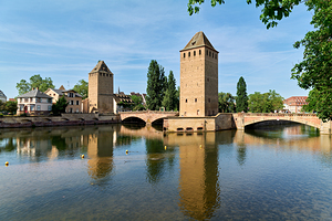 Covered bridges over water in Strasbourg Alsace France on a clea