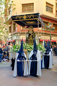 Easter procession in Zaragoza Spain with traditional garments