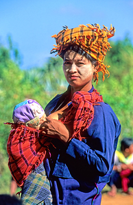 Portrait of Shan women with baby in Myanmar by Marco Brivio