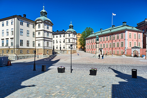 Exploring Gamla Stan in Stockholm during a sunny day by Marco Brivio