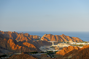 Aerial view of Muscat Oman showing mountains and sea