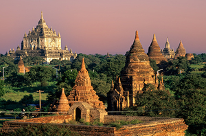 Temples in Bagan during sunset with ancient architecture visible by Marco Brivio