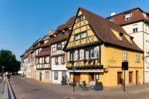 Timber framed houses line the street in Petite Venise Colmar