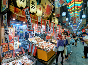Exploring Nishiki Market in Kyoto Japan during a busy afternoon